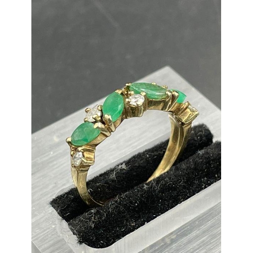 501 - A four stone jade and diamond ring Size L