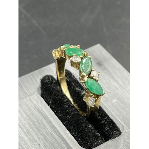 501 - A four stone jade and diamond ring Size L