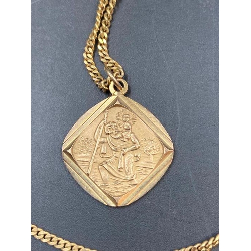 505 - A 9ct gold St Christopher on a 9ct gold chain (Approximate Total Weight 7g)