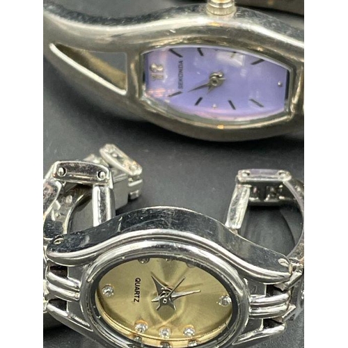 511 - A selection of four vintage watches to include Seiko and Sekonda.