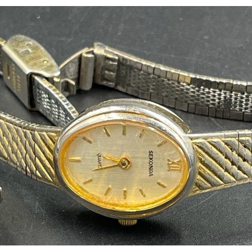 511 - A selection of four vintage watches to include Seiko and Sekonda.