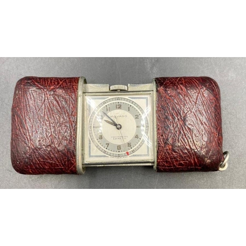 527 - A Movado red leather bound pocket watch