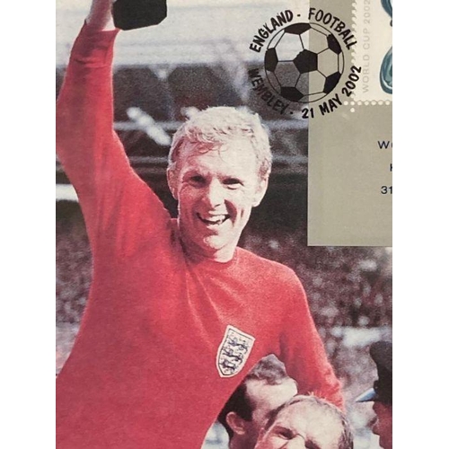 529 - A World Cup heroes of 1966 sovereign Coin First Day Cover to include a signed photograph of Bobby Mo... 