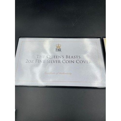 567 - A Jubilee Mint The Queen's Beasts 2oz silver coin cover.