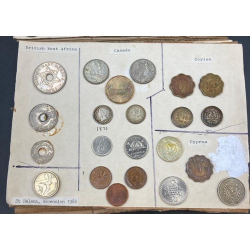 569 - A selection of International coins mounted on board, including Australia, Austria, Belgium, Brazil, ... 