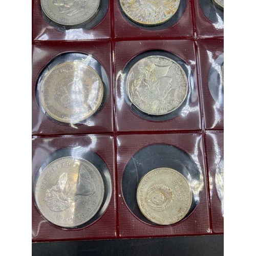 570 - A selection of coins to include: A Marie Theresa, Russian Rouble, 1927 USA silver dollar etc.