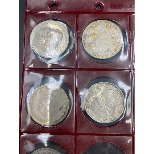 570 - A selection of coins to include: A Marie Theresa, Russian Rouble, 1927 USA silver dollar etc.