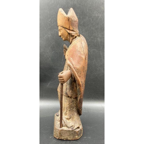 592 - A wooden carved statue of Saint Blaise the bishop of Sebask, possibly 14th Century