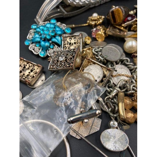 616 - A small selection of costume jewellery along with, badges, watches and keyring.