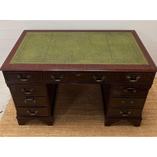 62 - A mahogany pedestal desk with green leather top (H77cm W120cm D61cm)