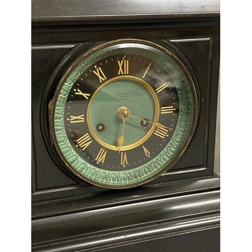 627 - A slate clock on gilt feet by Connell of London