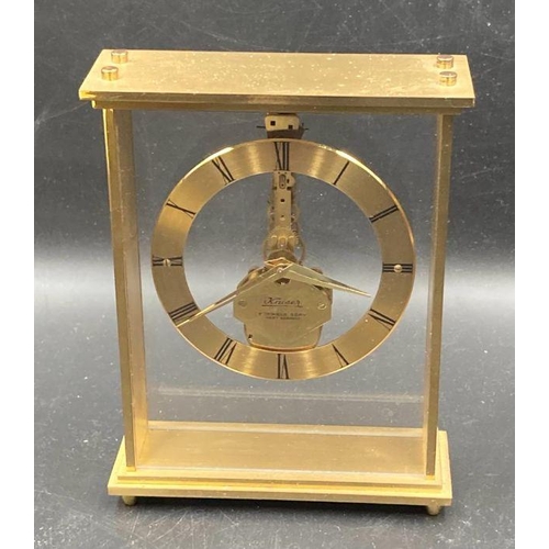 628 - Two clocks, A Roskoff and Co glass spherical desk clock and a carriage clock by Kaiser