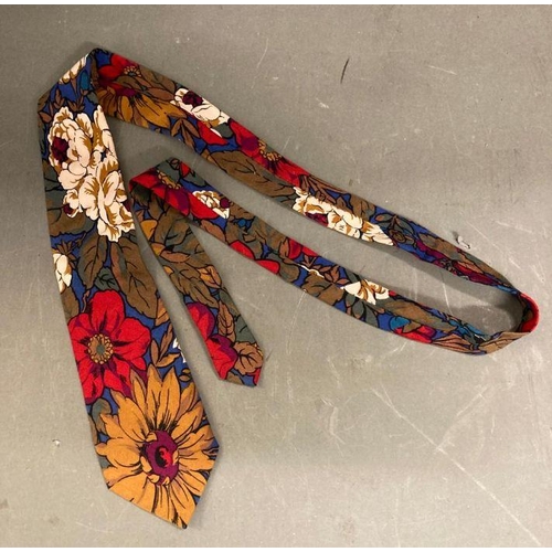 629 - Two vintage silk ties. A floral Liberty print and an official Apple corps Beatles 