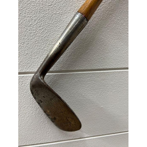 642 - Four wooden vintage golf clubs