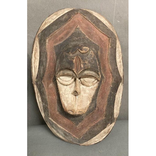 648 - A selection of three traditonial African masks