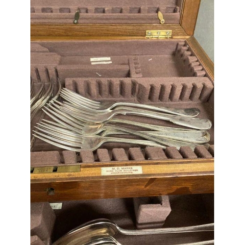 659 - An oak canteen of white metal and silver plate cutlery