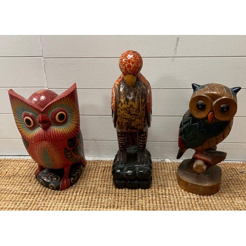 672 - Three wooden owls