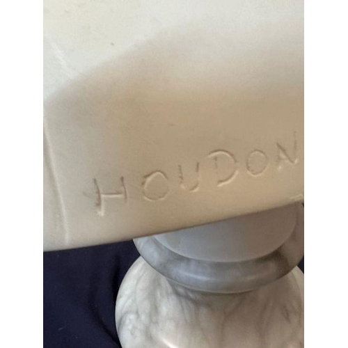 674 - A bust of a boy on a marble base signed Houdon 1875