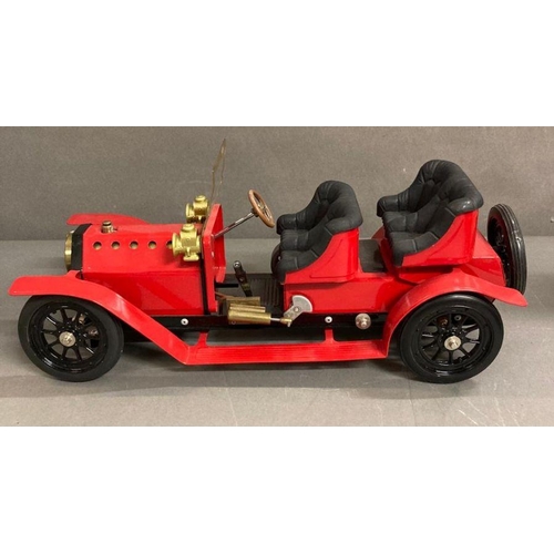 679 - A Mamod Ford branded four seater steam car