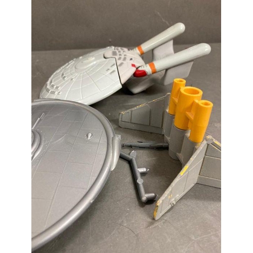 716 - A selection of play worm toys to include the USS Enterprise