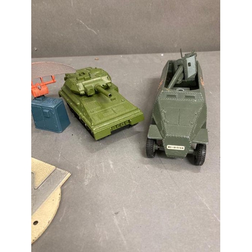 720 - A selection of play worn Diecast, military toys to include Dinky and Corgi