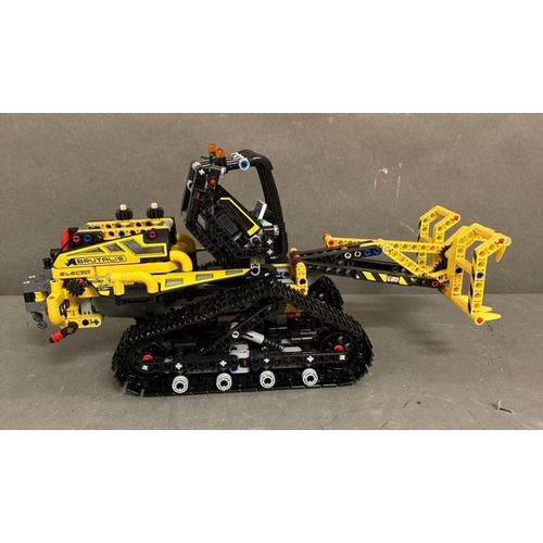 725 - Two Lego Technic model, A Bulldozer and a crane with grabber