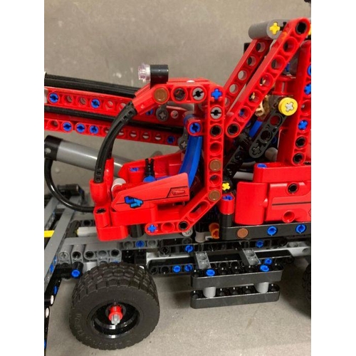 725 - Two Lego Technic model, A Bulldozer and a crane with grabber