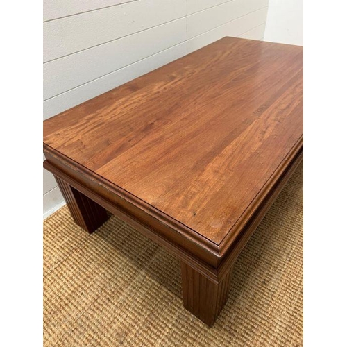 86 - A hardwood coffee table with drawer to centre (H48cm W130cm D74cm)