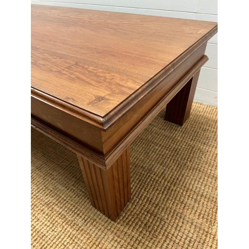 86 - A hardwood coffee table with drawer to centre (H48cm W130cm D74cm)