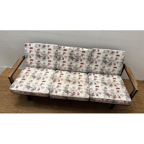 87 - A Medicom Toy Japanese's Futarigake sofa, three seater with designer fabric (H72cm W177cm D56cm)