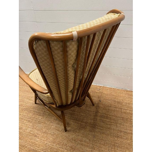 90 - An Ercol blonde evergreen high back chair