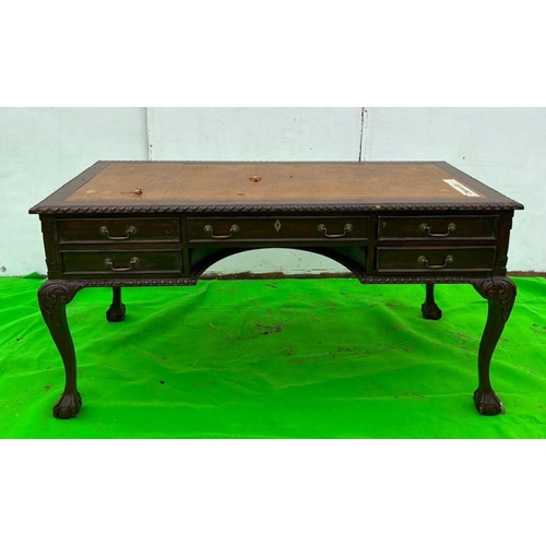 93 - A mahogany desk on ball and claw feet AF (H80cm W160cm D80cm)