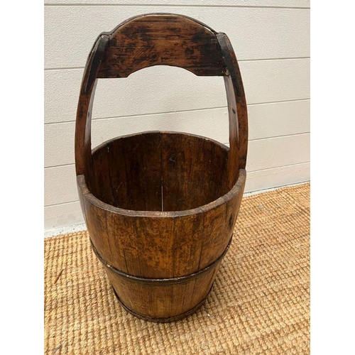 726 - A Chinese elm and iron bucket