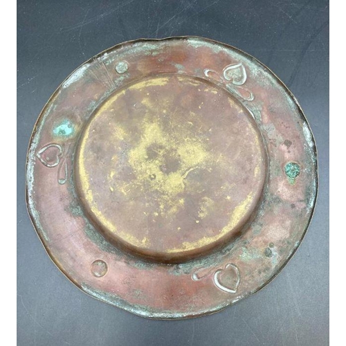 120 - An Art Nouveau brass plate approximately 20cm in diameter