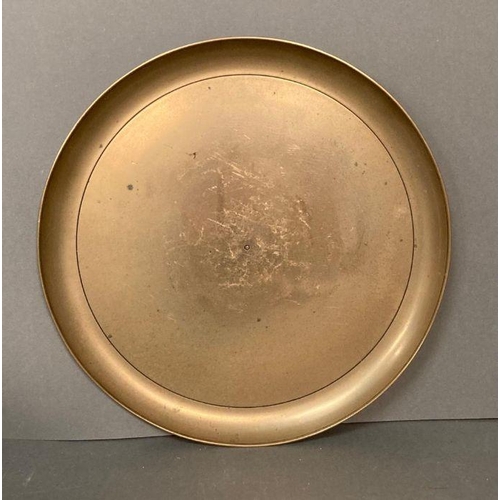 123 - A selection of brass items to include candle sticks and a plate