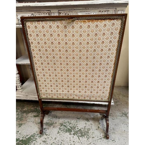 14 - A mahogany framed fire screen on splayed feet with floral tapestry insert