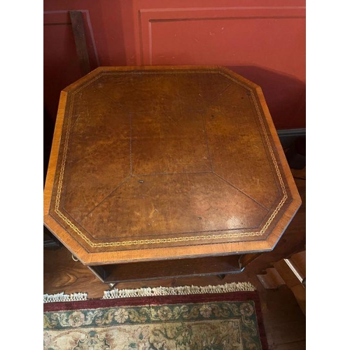 23 - A leather top barristers side table with brass lion heads to corner (H73cm SQ63cm)