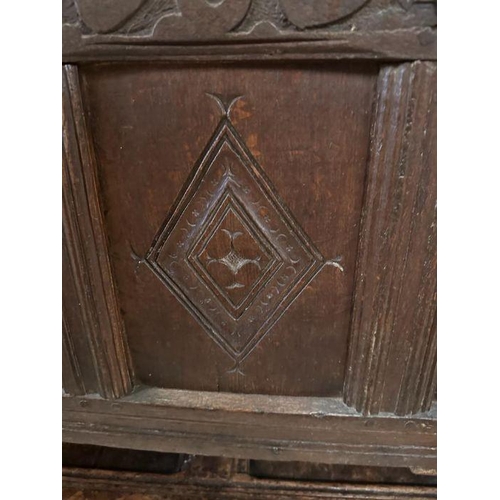 29 - An oak early 18th Century four carved panelled coffer. (H62cm  D53cm W120cm)