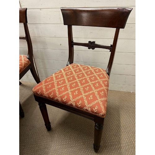 33 - A William IV style mahogany dining table, circular top over a octagonal column and raised on a tri-f... 