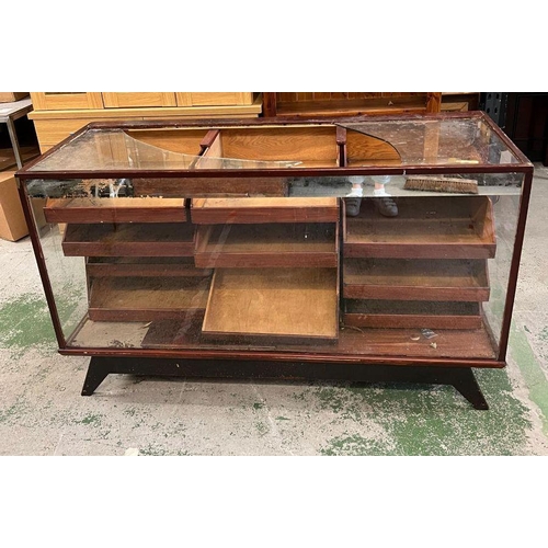 34 - A Haberdashery counter with graduated drawers and glazed sides (the top has been smashed) (H90cm W15... 