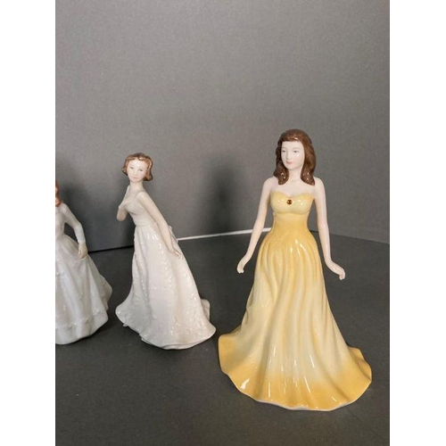 48 - A selection of eight Royal Doulton figures to include Embrace, Summer Breeze and Harmony