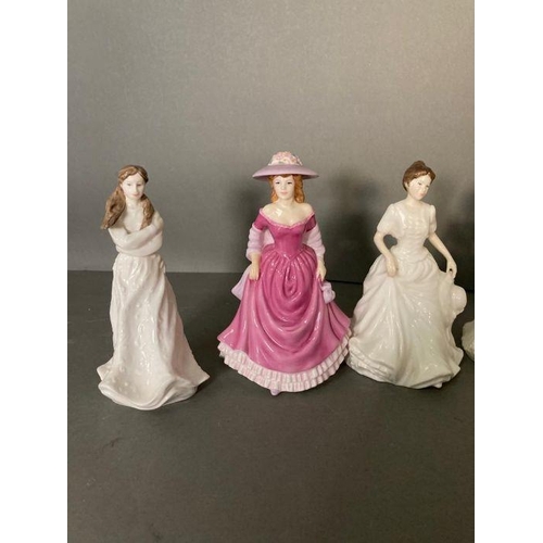 48 - A selection of eight Royal Doulton figures to include Embrace, Summer Breeze and Harmony