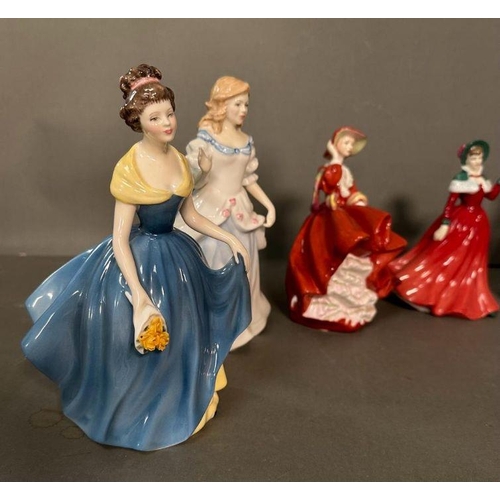 50 - A selection of eight Royal Doulton figures to include Winter Day, Melanie, Laura and Autumn Breeze