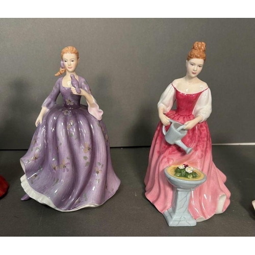 50 - A selection of eight Royal Doulton figures to include Winter Day, Melanie, Laura and Autumn Breeze