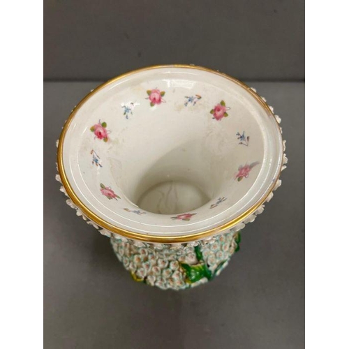 60 - A 19th century vase in the manner of Meissen with bird decoartion.