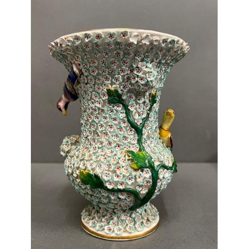 60 - A 19th century vase in the manner of Meissen with bird decoartion.