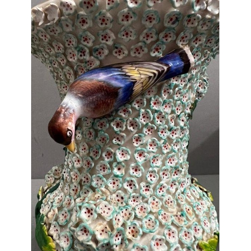 60 - A 19th century vase in the manner of Meissen with bird decoartion.