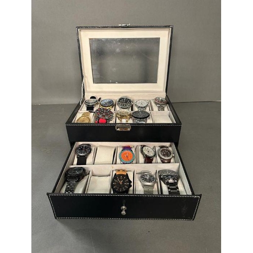 629 - A selection of wristwatches in display case to include: Bulova, Geneva, Skmei, Infantry, 18 in total... 