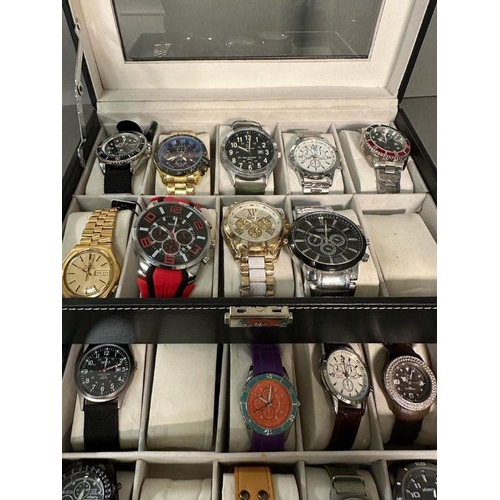 629 - A selection of wristwatches in display case to include: Bulova, Geneva, Skmei, Infantry, 18 in total... 