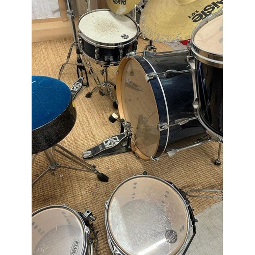 63 - A Tama drum kit to include: Sabian high hat, a selection of Paiste symbols, Custom Percussion drum s... 